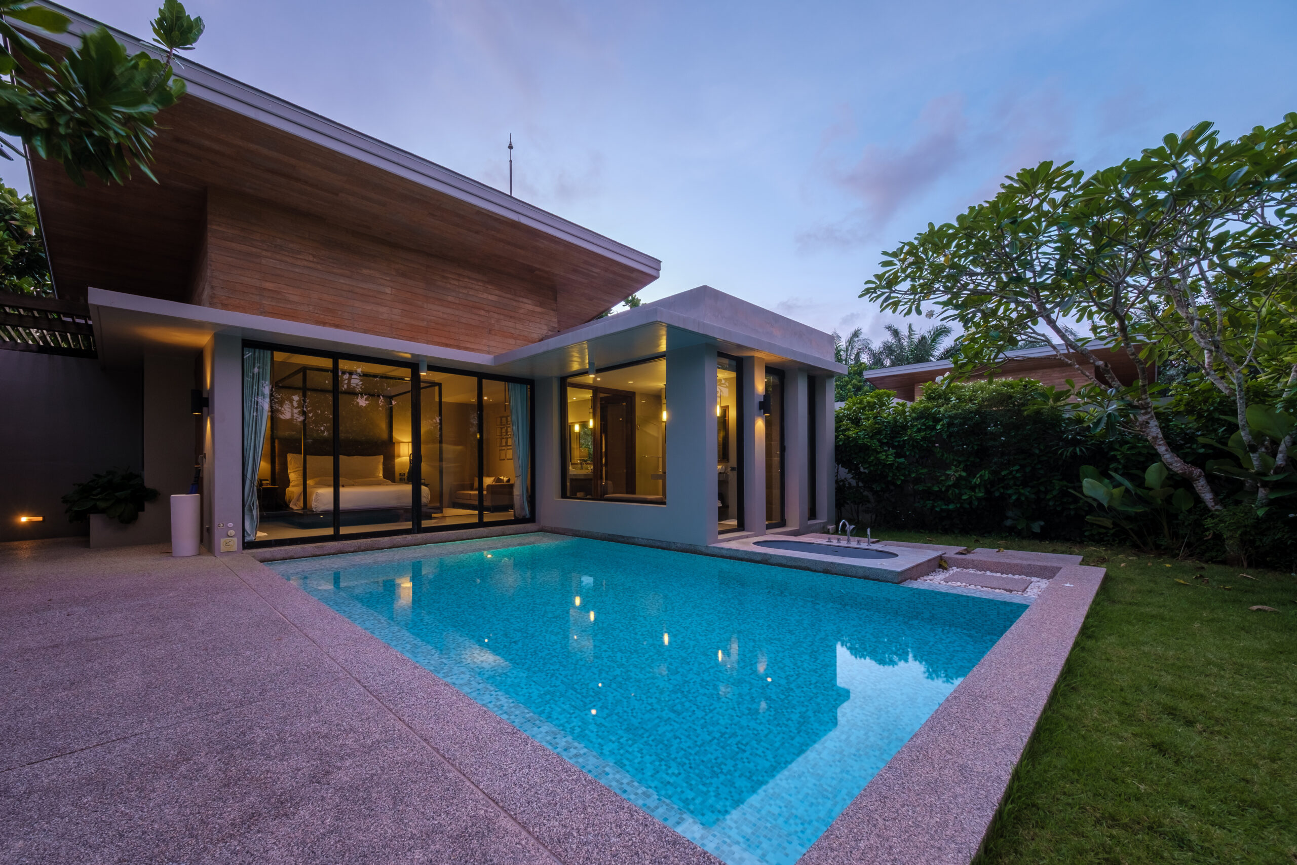 Modern house with a swimming pool, modern pool villa at the beach, luxury villa